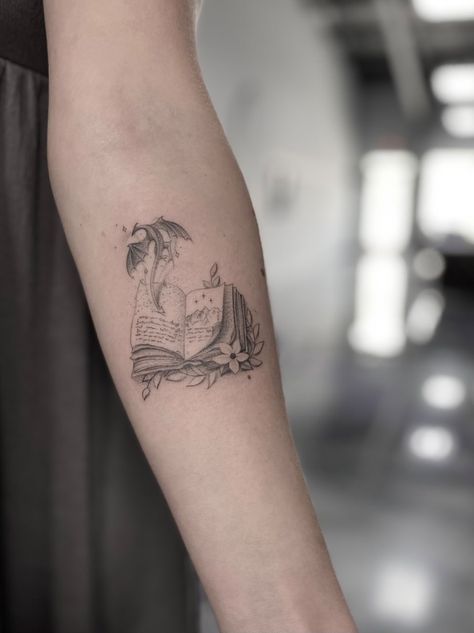 Book lover tattoo a court of mist and fury Sarah j Maas fine line style delicate fantasy Galaxy Book Tattoo, Tattoos For Bibliophile, Love To Read Tattoo, Book With Wings Tattoo, Books Tattoo Sleeve, Book Tattoo Inspiration, Delicate Fantasy Tattoo, Floral Bookish Tattoo, Mist Tattoo Ideas