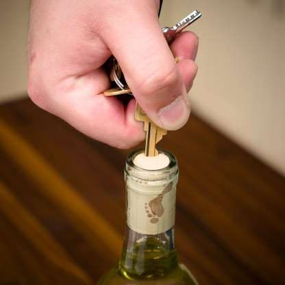 10 Ways to Open a Wine Bottle without a Corkscrew: Open Wine Bottle With a Key - Provided by The Family Handyman Open Bottle Without Opener, Wine Opener Hack, Open Wine Without Corkscrew, Wine Rack Towel Holder, Wooden Wine Crates, Open Wine, Diy Wine Bottle, Wine Variety, Pallet Wine