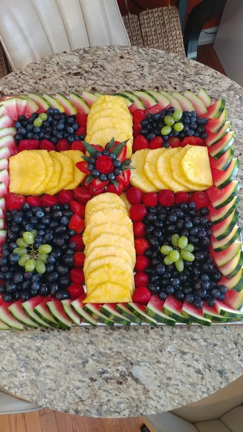 Fruit platter ideal for confirmation, christening or easter party by Sheila's Incredible Edibles. Easter Fruit Board Ideas, First Communion Fruit Platter, Passover Fruit Platter, Easter Food Table Setup, Fruit Platter Easter, Easter Themed Fruit Tray, Easter Cross Fruit Tray, Easter Cross Charcuterie Board, Easter Fruit Tray Cross