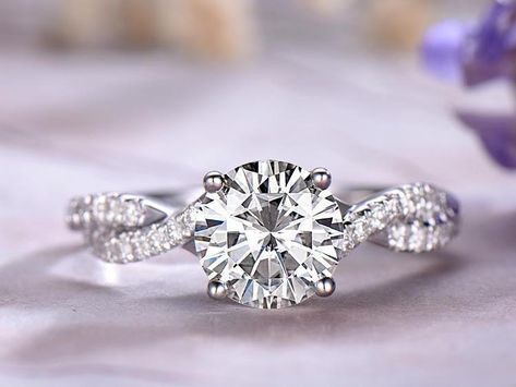 1.25 Carat Infinity Round Cut Moissanite and Diamond Engagement Ring in 9k White Gold £309.00 Infinity Engagement Ring, Engagement Rings Twisted, Cute Engagement Rings, Moissanite Diamond Rings, Moissanite Wedding Rings, Solid Gold Rings, Round Moissanite, Halo Diamond Engagement Ring, Ring Ideas