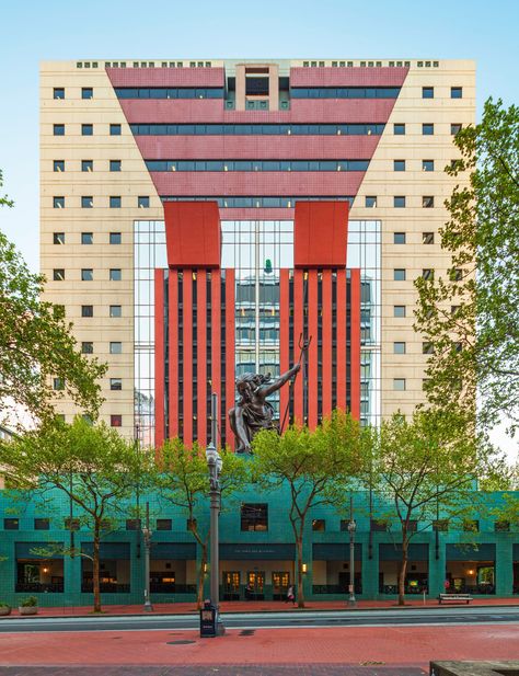 The Portland Building, located in downtown Portland, Oregon, showcases Graves’s signature mix of color, texture, and witty riffs on classicism.  The late American architect and designer and AIA gold medalist, who conceived more than 350 buildings and 2,000 product designs over the course of his 50-year career, was best known for his kooky, bright, kooky buildings and peppy product designs—a teakettle for Alessi, a toaster for JC Penney. Michael Graves Architecture Photos | Architectural Digest Famous Buildings Architecture, Post Modern Architecture Buildings, Modern Public Buildings Architecture, 1980 Architecture, Portland Building Michael Graves, Post Modern Architecture, Michael Graves, Colourful Buildings, Iconic Buildings