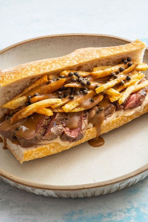 This sandwich is based on the classic steak, frites and sauce combination. We make a rich peppercorn sauce with two types of peppercorns and use it to make a peppercorn sauce mayonnaise, then serve the rest on the side in the style of a French dip. Of course, the sauce is perfect for dunking the extra chips into, too. Steak Frites Sandwich, Steak Sandwich Sauce, French Sandwiches, Side Ideas, Sandwich Sauces, Pub Grub, Types Of Sandwiches, Mayo Recipe, Veal Recipes