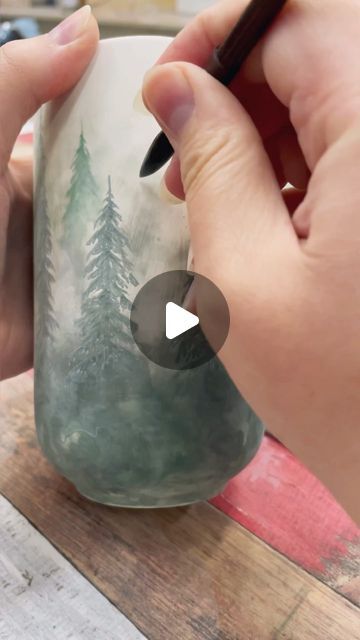 Aleksandra Buyanova on Instagram: "I show the process and result of painting with @amacobrent underglaze paints of the LUG series. To achieve a watercolor effect, you just need to add water to the paint. Since there are few options in this line, don't be afraid to mix colors to get the right shade.  #amaco #amacoglazes #ceramicsprocess #amacounderglaze #ceramicspainting #makers #plate #art #ceramicvideo #illustration #artworks #mug #ceramic #pottery #ceramics #skandinavianhome #cup #potteryart #ceramiclife #potterypainting #potterydesign #berlinceramics #berlin #wood #contemporaryceramics  #potterylove #loveceramics #forest" Celadon Over Underglaze, Ceramic Mug Underglaze, Forest Pottery Painting, Ceramics Underglaze Painting, Cone 10 Reduction Glazes, Cup Ceramic Painting, Watercolor On Pottery, Amaco Toasted Sage Glaze Combinations, Watercolor On Ceramics