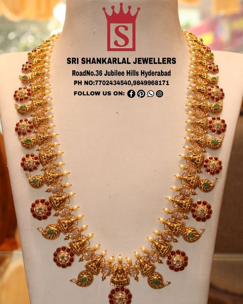 Latest nakshi bottu mala haram in light weight heavy looking and vast collection Please visit us on video 📞 7702434540,9849968171 to see more collections #22ktgoldjewellery #22karat #southindianweddings #southindianjewellery #bridaljewellery #haram #srishankarlaljewellers Bottu Mala Jewellery Designs Gold, Nakshi Bottu Mala Designs, Mango Bottu Mala, Latest Long Haram Gold Jewellery Designs Antique, Light Weight Nakshi Haram, Latest Mango Haram Designs, Light Weight Mango Haram Designs, Bottu Haram Latest Designs, Mango Mala Jewellery Gold Latest