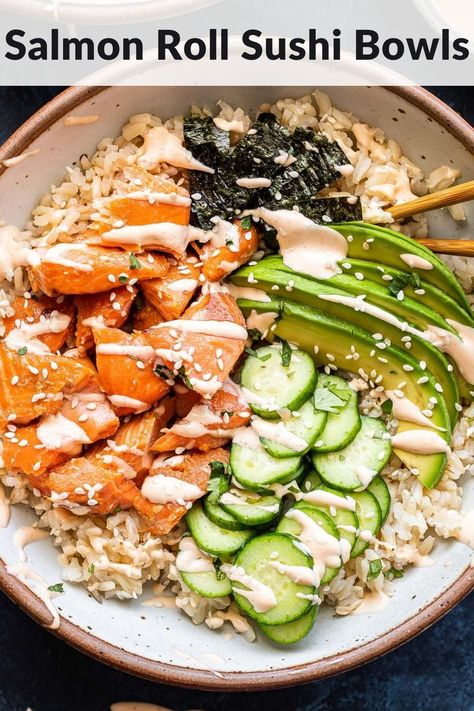 If you love salmon roll sushi then you'll love these Salmon Roll Sushi Bowls! Baked sesame ginger salmon on top of rice with cucumber, sliced avocado, nori, and drizzled with spicy mayo. It's the perfect way to get your sushi fix at home! #salmonroll #sushi #sushibowl #salmon #salmonsushi #sushirollbowl #bakedsalmon #Asianrecipes #healthydinner #spicymayo Salmon Roll Sushi, Salmon Sushi Rolls, Sushi Bowl Recipe, Sushi Bowls, Ginger Salmon, Salmon Roll, Salmon Rice Bowl, Sliced Avocado, Roll Sushi