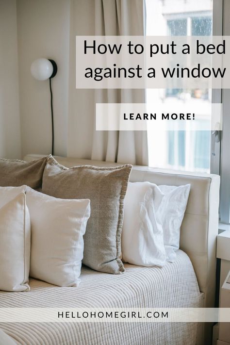 Yes, it’s possible to place a bed against a window. Find out how you can put your bed against a window without destroying your wall or window. Say goodbye to wasted space and hello to a stunning bedroom makeover! 😍 Discover clever and stylish ways to put a bed against a window and create the ultimate cozy retreat. 🛌🌟🌇👌📌 Save this Pin for later! Wall Between Windows Bedroom, How To Style Bed In Front Of Window, Not Centered Window In Bedroom, Storage Around Window Bedroom, Bed Under The Window Ideas, Headboard Blocking Window, Bed Against The Window Ideas, Window Treatments Above Bed, Hide Bedroom Window