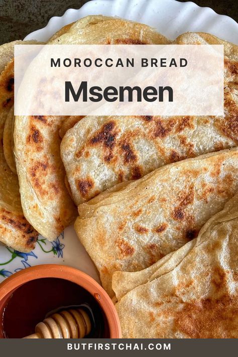 Learn how to make the irresistible Moroccan breakfast flatbread, Msemen! This homemade flatbread, made with fine semolina, is a cornerstone of Moroccan cuisine. Its crisp exterior and soft interior make it ideal for any time of day. Try our easy, authentic recipe and bring a taste of Morocco to your home. Save and share this delicious find with fellow food enthusiasts! Moroccan Msemen Recipe, M'smen Recipe, Moroccan Bread Recipe, Moroccan Food Recipes Traditional, Easy Moroccan Recipes, Malawah Bread, Moroccan Flatbread Recipe, Morrocan Recipe, Msemen Recipe