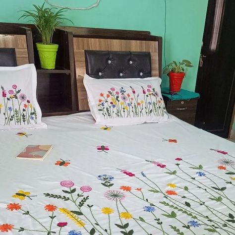 Dcushioncover Cushion on Instagram: "Beautiful hand embroidered customized bed cover 1+2 😍😍  Give ur house a traditional touch with this beautiful hand embroidered bedcover or can be gifted to  who loves the handmade or hand embroidered products  Material -cotton fabric  Size - king size 108*108"  16*27" size pillow cover    White base color  Product care instructions  ❤ wash with mild detergent ❤wash it with hands  ❤dry in shade   ❌machine wash  All our handlooms  needs our care😀😀  Customisation of color and size available  Dm us for order 😀😀  #dcushioncover #embroiderydesign  #embroideryhoop  #embroidery  #embroideryart #smallbusiness #handembroidered  #handmade  #instagram  #reels" Bedsheet Embroidery, Handmade Bed Sheets, Embroidered Things, Embroidered Sheets, Embroidered Products, Bed Cover Design, Designer Bed Sheets, Cushion Embroidery, Easy Dress Sewing Patterns