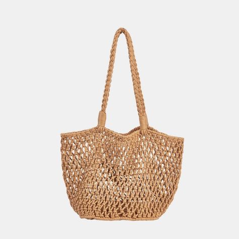 Introducing the Tan Open Weave Tote. The open weave design adds a touch of laid-back charm, making this tote the perfect companion for both beach days and casual outings. This tote offers both fashion and function, providing plenty of space to carry your essentials while complementing your summertime wardrobe. Whether you're heading to the beach, running errands, or meeting friends for a leisurely brunch, this tote is a chic and convenient option to complete your look. Product code: CAC12F4B001H Everything Is Everything, Mexico Outfits, Elegant Handbags, Fashion Thrift, Italy Fits, Boat Tote, Train Cake, Vegan Leather Tote Bag, Knitting Tote Bag