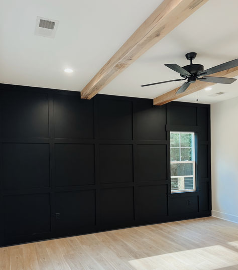 Black Wall Rustic Bedroom, Bedroom Accent Wall Pitched Ceiling, Black Square Accent Wall, Black Accent Wall With Wood Trim, Black Panelled Wall Bedroom, Basement Bedroom Ideas Master Suite Layout, Dark Wall Behind Bed, Dark Accent Wall Behind Bed, Guest Bedroom Ideas Basement