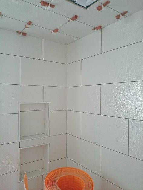 How to tile a ceiling Tiled Tub Surround, Shower Ceiling Tile, Tiling A Bathroom, Tiled Tub, Ceiling Tiles Bathroom, Tiles In Bathroom, Shower Ceiling, Tile Ceiling, Large Tiles