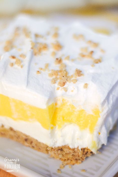 Lemon Lush Dessert - Granny's in the Kitchen Lemon Lush Recipe, Lemon Lasagna, Coconut Bread Pudding, Graham Dessert, Pudding And Cool Whip, Lemon Lush Dessert, Lemon Delight, Cheesecake Lemon, Lush Cake