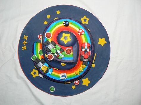 Mario Kart a Rainbow Road cake Rainbow Road Cake, Road Birthday Cake, Mario Kart Rainbow Road, Mario Bday Party, Rainbow Road Mario Kart, Mario Kart Cake, Road Cake, Mario Kart Wii, Mario Theme