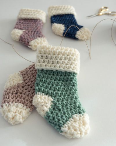 How to Make Mini Crochet Stockings Quick and Easy + Free Pattern (Free Pattern + Tutorial) Crochet Mini Xmas Stocking, Crochet Mini Mitten Ornament, Stocking Ornament Crochet Pattern, Crochet Mini Sweater Pattern Free, Crochet Christmas Sock Ornament, Crochet Project Template, Crochet Mini Stocking Pattern Free Easy, Free Crochet Pattern Mini Christmas Stocking, Diy Ornaments Crochet