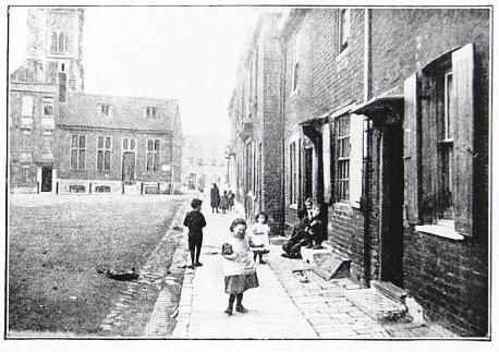 News Shopper: Children play on Deptford Green in 1897 London Slums, Victorian Britain, Urban Poverty, Penzance Cornwall, Old Greenwich, The Blessed Sacrament, St Nicholas Church, Greenwich London, East End London