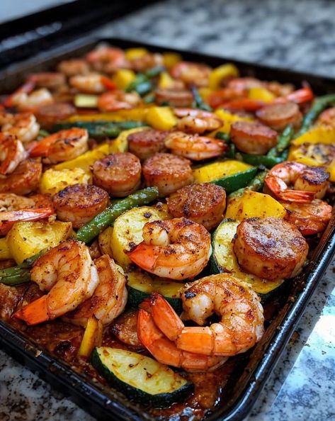 Flavorful Cajun Shrimp & Sausage with vibrant veggies! Quick, easy, and perfect for any weeknight dinner. One pan, minimal cleanup. #CajunCooking #SheetPanMeals #HealthyDinner #EasyRecipes Easy Healthy Meals With Shrimp, Sheet Pan Shrimp Bake, Cajun Shrimp And Veggies, Healthy Shrimp And Sausage Recipes, Easy Weeknight Dinners Shrimp, Sausage Pan Meal, Cajun Sheet Pan Dinner, Sausage And Shrimp Skillet, Sausage Shrimp And Potatoes