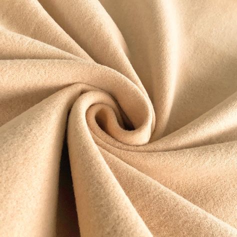 Beige Wool-Like Melton Fabric- available now at the UK's lowest price! Melton fabric is a dense tightly woven fabric that is felted and heavily brushed for an ultra soft hand. This fabric looks and feels like wool but is mix of polyester and viscose. This versatile fabric can be used for coats, jackets, vests, blankets Wool Fabric Texture, Classical Academia, Boiled Wool Fabric, Maxi Skirt Tutorial, Diy Maxi Skirt, Black Lace Fabric, Fashion College, Charles James, Skirt Tutorial