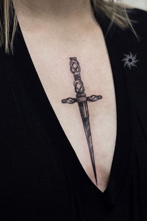 Chest Knife Tattoo, Knife Between Chest Tattoo, Knife Chest Tattoo Female, Sternum Knife Tattoo, Dagger Tattoo Chest Woman, Knife Tattoo Chest, Celtic Dagger Tattoo, Swords Chest Tattoo, Swords Sternum Tattoo