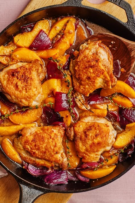 Sometimes frozen fruit works better than fresh, and this dish is the perfect example of why—a shorter prep time and a jump-start on a delightfully jammy texture. Already peeled, pitted, and sliced peaches take a delicious turn when cooked with golden brown, crispy skin-on chicken thighs, lending their delightful sweetness to a rich and tangy pan sauce. Brightened with the zippy notes of apple cider vinegar and the zesty kick of mustard, this is a one-pan wonder perfect for a cozy weeknight. Chicken And Peaches, Skillet Chicken Thighs, Sliced Peaches, Pan Sauce, Bon Apetit, Sweet Potato Wedges, Food Holidays, Gourmet Meals, One Pan Chicken