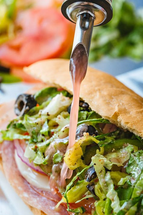 Classic Italian Sub Sandwich | thecozyapron.com Tortellini Pesto, Italian Sub Sandwich, Sub Sandwich, Genoa Salami, Italian Sub, Red Wine Vinaigrette, Italian Sandwich, Food Sandwiches, Pizza Sandwich