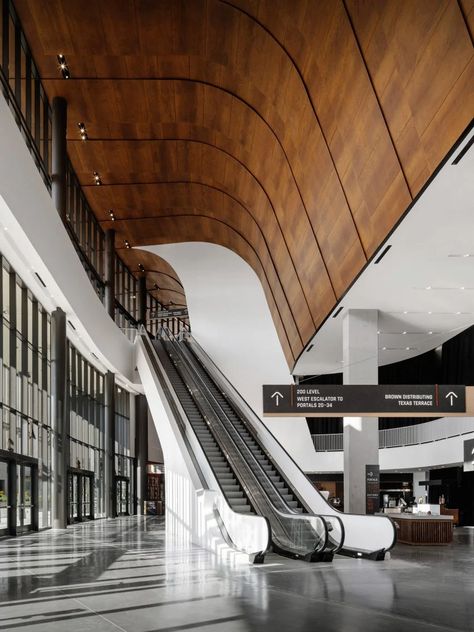 Gensler tucks flexible arena under vernacular wooden canopy in Austin Campus Masterplan, Center Basketball, Arena Design, Interior Design Schools, Canopy Ideas, Hockey Arena, Elevator Lobby, Wooden Canopy, Lift Lobby