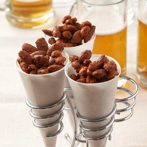 Throwing a get-together and serving drinks? Try these flavorful nuts as an easy party food that will pair wonderfully with a variety of beers and cocktails. Football Shaped Foods, Dutch Wonderland, Party Food For A Crowd, Spicy Nuts, Hearty Snacks, Fresh Fruit Recipes, Anniversary Party Ideas, Snack Mix Recipes, Easy Party Food