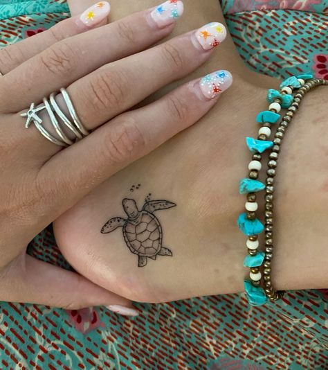 Turtle And Starfish Tattoo, Cute Tiny Hand Tattoos, Date And Flower Tattoo, Turtle Tattoo Placement Ideas, Indigenous Turtle Tattoo, Tattoo Ideas Female First Tattoo, Ankle Tattoo Turtle, Tattoo Ideas To Represent Family, Tattoo Ideas Ankle Female