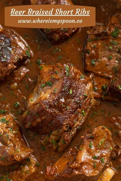 These melt-in-your-mouth, flavorful beer-braised short ribs with Guinness are best served on a bed of creamy mashed potatoes. This is comfort food at its best! #whereismyspoon #beershortribs #shortribsrecipe #braisedshortribs #cookshortribs #beefshortribs #guinnessshortribs #guinnessribs #guinnessrecipe #stpatricksdayrecipes #stpatricksdayfood Braising Ribs, Short Ribs Dutch Oven, Cooking Beef Ribs, Short Ribs In Oven, Short Rib Recipes Oven, Short Rib Beef Stew, Beer Braised Short Ribs, Ribs Recipe Oven, Short Rib Stew