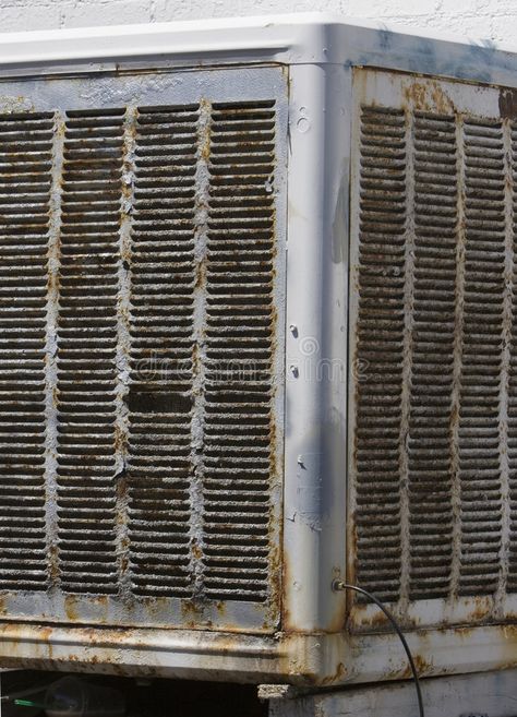 Old evaporative cooler. An old rusty evaporative cooler (swamp cooler #Sponsored , #Ad, #Sponsored, #evaporative, #rusty, #swamp, #cooler Swamp Coolers, Swamp Cooler, Evaporative Cooler, Window Air Conditioner, Room Window, Window Room, Air Cooler, Water Cooler, Stock Photography Free