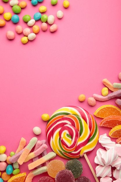 Colorful candies lollipops and jelly on ... | Premium Photo #Freepik #photo #jelly-candy #sugar-candy #gummy-candy #gummies Candy Store Background, Candy Aesthetic Lollipop Wallpaper, Sweets Background, Lollipop Aesthetic, Lollipop Background, Candy Wallpaper Sweets, Sweets Illustration Candy, Expressive Lettering, Candy Gummies