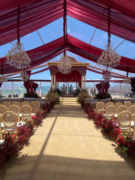 africa wedding, mandap ideas, beach mandap, by the sea mandap, floral mandap, floral decor, decorators, wedding ceremony, wedding decor, wedding festivity, wedding photos, functions, wedding day, pink floral mandap, pink flowers, carnation, wedding venue, wedding indian, floral, planner, wedding plan, wedding venue, destination wedding, muhurat, shaadi, planner, lagos wedding, beach wedding, wedding aisle Wedding Mandap Ideas, Beach Mandap, Royal Wedding Decor, 25th Wedding Anniversary Decorations, Indian Mandap, Wedding Mandap Decor, Red Indian Wedding, Mandap Ideas, Floral Mandap