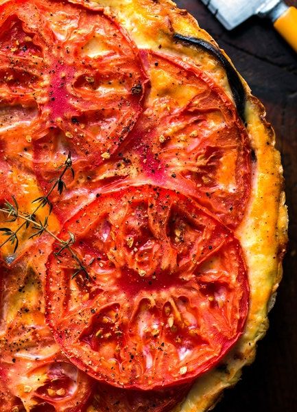 This robust summer pie, topped with a layer of tomato slices flecked with thyme, is a nice party piece. It also packs well once cooled, so take leftovers to work for lunch. (Photo: Andrew Scrivani for The New York Times) Eggplant And Tomato Pie, Eggplant Pie, Eggplant Pizza Recipe, Lunch Photo, Tomato Eggplant, Eggplant Pizza, Tomato Pie Recipe, Summer Pie, Eating Well Recipes