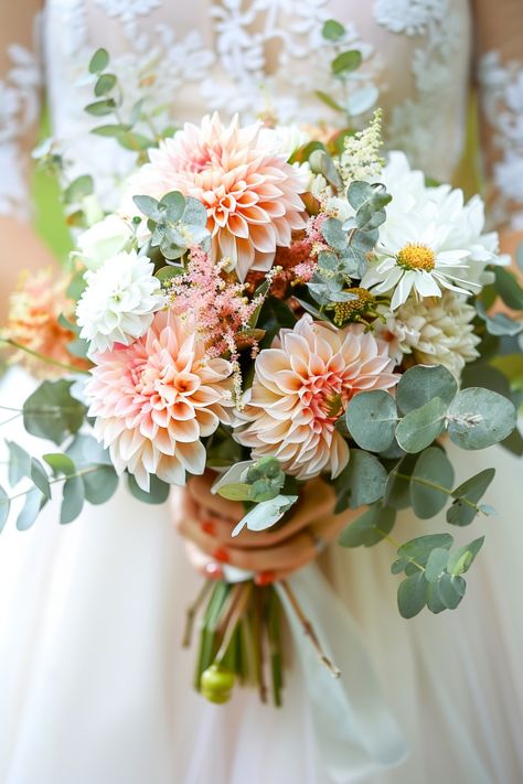 Discover 130+ gorgeous wedding bouquets with eucalyptus and elevate your wedding style. Find your dream bouquet now! #WeddingInspo #EucalyptusBouquets #BridalIdeas Click to explore the collection! Bridesmaid Floral Hoop, August Wedding Bouquet Ideas, Peachy Wedding Flowers, Simple Wedding Bouquet Summer, Dalia Wedding Bouquet, Wedding Bouquets With Eucalyptus, Dahlia Bouquet Wedding, Spring Wedding Flower Arrangements, Bridal Bouquet With Eucalyptus