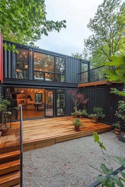 Modern shipping container home courtyard with decks and porches. Check out these shipping container homes and learn their advantages, design appeal, and unique characteristics. Container Luxury Homes, Container Tiny Homes Ideas, Industrial Shipping Container Home, Shipping Container Courtyard, Shipping Container Add On To House, Shipping Container Playhouse, Houses Made Out Of Shipping Containers, Inside Container Homes, Cargo Container Homes Floor Plans