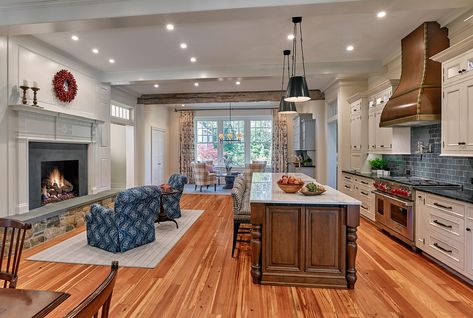 Archer & Buchanan Architecture | New Breakfast Area, Kitchen with fireplace and Sitting Area in addition to 1830s farmhouse. #farmhouse #fireplace #stonehearth #kitchenisland #pancoastclifford #patriciagorman #donpearsephotographers Large Kitchen With Fireplace, Kitchen Cabinets Around Fireplace, Farmhouse Kitchen With Fireplace, Fireplace Seating Area Cozy, Kitchen With Hearth, Kitchen With Sitting Area Layout, Kitchens With Fireplaces And Island, Fireplace Near Kitchen, Fireplaces In Kitchens