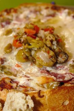 This delicious dip is inspired by my husband's favorite Cajun delight: the Muffuletta sandwich! Mardi Gras Muffuletta Dip is a decadent cheesy dip that is a perfect Mardi Gras appetizer to share with friends this Fat Tuesday! Cajun Dip Appetizers, Muffuletta Dip Recipe, Mari Gras Food, Cajun Christmas Food, Muffaletta Dip, New Orleans Appetizers, Cajun Dip, Muffuletta Dip, Fat Tuesday Recipes