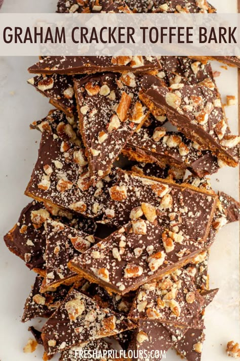 A twist on the classic toffee bark-- made with an easy butter and brown sugar toffee, this graham cracker toffee bark is a perfect sweet, salty, and sticky treat. Dress it up with festive sprinkles for holidays or other celebrations! via @frshaprilflours | easy graham cracker toffee bark recipes | toffee bark with graham crackers | christmas toffee bark | christmas bark easy cracker toffee | christmas toffee bark recipes Gram Cracker Toffee Bark, Toffee Gram Crackers, Caramel Graham Cracker Bark, Cowboy Bark Pioneer Woman, Christmas Bark Graham Crackers, Avalanche Bark Recipe, Graham Cracker Bark Christmas, Toffee With Graham Crackers, Pretzel Cracker Bark Recipe