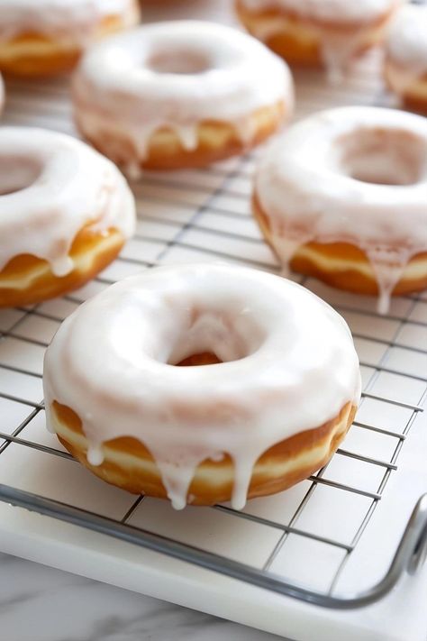 Skip the drive to your local donut shop and make these easy pancake mix donuts instead. They’re soft, sweet, and begging to be devoured. Pancake Mix Donuts Recipes Baked, Donuts Glaze Recipe, Traditional American Breakfast, Easy Doughnuts, Glazed Donut Recipe, Easy Pancake Mix, Donut Icing, Snack Collection, Doughnut Recipe Easy