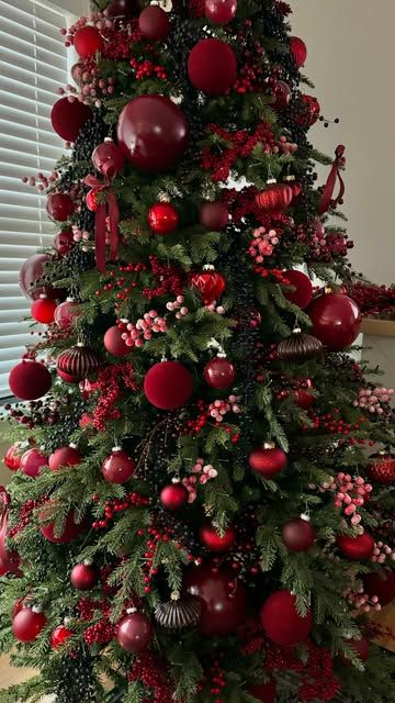 Sheri Wilson on Instagram: "Burgundy Berry Christmas Tree 🍇🍷Comment SHOP to receive a DM with the link to shop this post!  I’m so excited to put up our first Christmas tree of the year! This might just be my favorite one yet, the berry inspired colors have me swooning 🥰   inspired by @livinwithmb   #christmas #christmasmood #cozyhome #christmascountdown #christmastree #christmasdecor #christmasdecorations #burgundy https://liketk.it/4WTns" Bows And Berries Christmas Tree, Christmas Tree Cranberries, Christmas Tree Red Berries, Christmas Tree Red Green And Gold, Christmas Tree Ideas Red And Green, Burgundy And Green Christmas Tree, Red And Green Christmas Tree Ideas, Plum Christmas Tree, All Red Christmas Tree