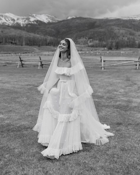 barefoot + breezy. I think @taylor_hill created a whole summer bride vibe. can’t wait to frolic through these mountains again this… | Instagram En Blanc Wedding Dress, About Time Wedding Dress, Boho Wedding Dress With Flowers, Veil With Strapless Wedding Dress, Old Western Wedding Dress, Western Inspired Wedding Dresses, Taylor Hill Wedding Dress, Jaw Dropping Wedding Dress, Vintage Country Wedding Dresses