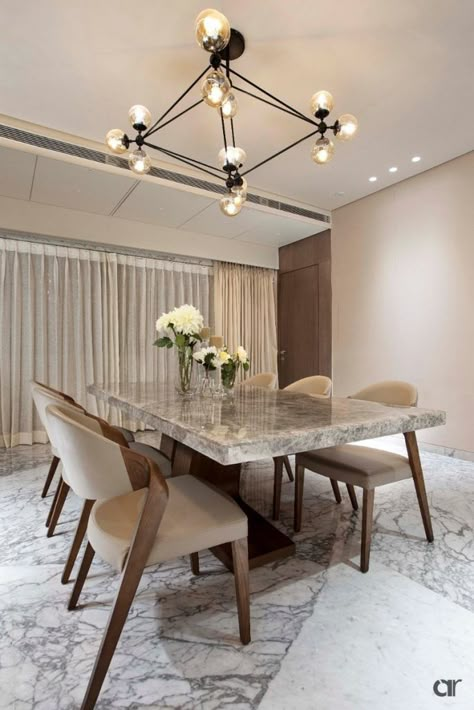 Clean Lines And Bold Accents Convert This Apartment Into Luxurious Oasis | Anjali Rawat Architects - The Architects Diary Table Design Modern, Dining Table Design Modern, Dining Interior, Dining Room Design Modern, Marble Top Dining Table, Luxury Dining Table, Dining Room Paint, Floor Apartment, Dining Room Wallpaper