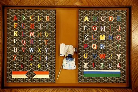 Alphabet boards showing different fonts and sizes are seen in the Goyard store on Tuesday, March 19, 2013 in San Francisco, Calif. Photo: Lea Suzuki, The Chronicle Goyard Tote Monogram, Goyard Monogram, Alphabet Board, Goyard Tote, Painted Trunk, Goyard Bag, White Lab, Union Square, Different Fonts