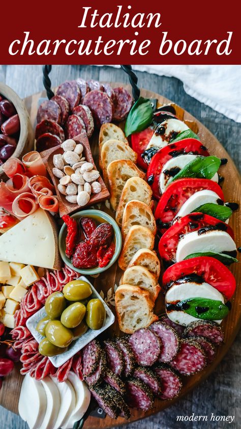 Italian Charcuterie Board. A beautiful Italian Charcuterie board filled with Italian meats and cheeses and paired with sauces, fruits, and vegetables. Perfect to pair with your Italian meal. Italian Charcuterie Board, Italian Charcuterie, Antipasto Platter Italian, Meat Cheese Platters, Charcuterie Board Party, Modern Honey, Charcuterie Appetizers, Christmas Charcuterie, Charcuterie Ideas