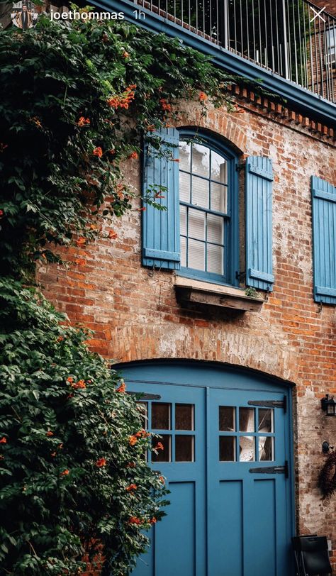 Blue Garage Door Brick House, Brick House Painted Blue, Blue Shutters Brick House, Blue And Brick House Exterior, Update House Exterior, Skylights Living Room, Brick Houses Exterior, Blue Door House, Living Room Flowers