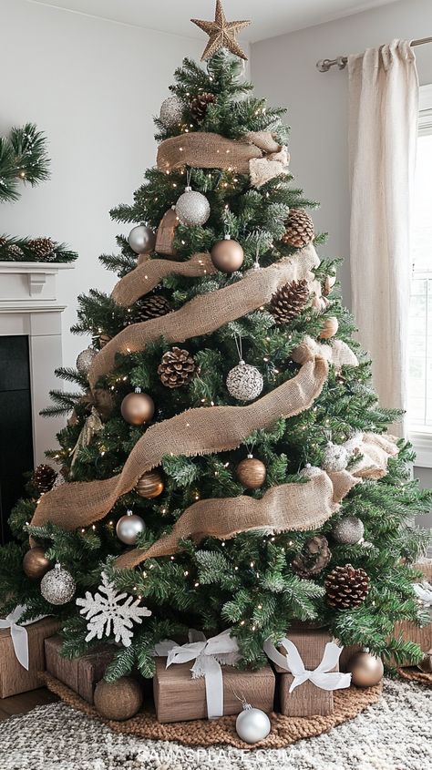 Discover 21+ gorgeous Christmas tree ideas for 2024 to make your home sparkle this season! Create a timeless look with classic red and green decor or opt for a chic vibe with silver, gold, or rose gold ornaments. For a cozy feel, try a rustic farmhouse theme featuring burlap ribbons and wooden accents. #ChristmasTreeDecor #HolidayTreeIdeas #Christmas2024Decor #FestiveTreeInspo Wood Theme Christmas Decor, Men’s Christmas Tree Ideas, Christmas Tree Decorated With Pinecones, Silver And Burlap Christmas Tree, Whimsicle Christmas Tree, Neutral Aesthetic Christmas Tree, Country Rustic Christmas Tree, Beige And Green Christmas Tree, Brown Christmas Decorations Ideas