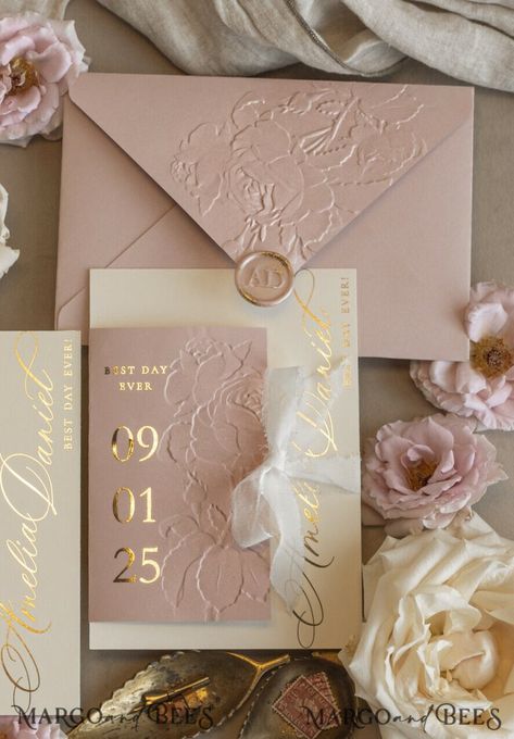 Set the tone for your dream wedding with our Blush Gold Wedding Invitation, a perfect harmony of sophistication and charm. This invitation features a soft blush palette accented by luxurious golden hues, creating a design that feels both modern and timeless. The addition of a chiffon torn bow brings an ethereal softness, making it ideal for couples who want their wedding stationery to exude romance and grace. The intricate wrapping showcases golden elegant roses, a design that symbolizes beauty White Pink Gold Wedding, Ethereal Wedding Invitations, Blush Pink Gold Wedding, Boho Style Wedding Invitations, Pink Gold Wedding, Blush Pink Wedding Invitations, Wedding Colors Ideas, Ivory Wedding Invitations, Wedding Invitations Uk