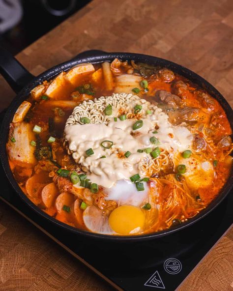 Authentic Korean Army Stew Recipe - GENIUS EATS Korean Army Stew Recipe, Army Stew Recipe, Korean Army Stew, Budae Jjigae, Mushroom Ramen, Korean Army, Green Onion Pancake, Korean Chili Paste, Korean Side Dishes