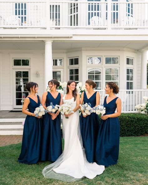 One last gorgeous summer hurrah on the harbor 🌊 Katherine’s bridesmaids wore our Navy Shantung Harper dress with the Dahlia skirt to create an especially elegant look, fitting for such a timeless celebration. Classic brides, save this one for bridal party/all-white bouquet/invitation suite inspiration! Congratulations to the newlyweds, Katherine and Jack! 🥂 Planning @elsilueventplanning Photography @jessicavandermarelphoto Videography erickdavid.films Florals @florarae_ Hair @balayage_bybroo... Navy Blue Bridal Party Color Combos, Mixed Blue Bridesmaid Dresses, Navy Blue Bridesmaid Dresses Long, Navy Blue Bridal Party, Navy Blue Wedding Party, Navy Wedding Party, Navy Bridal Party, Navy Bridesmaids Dresses, Long Navy Blue Bridesmaid Dresses