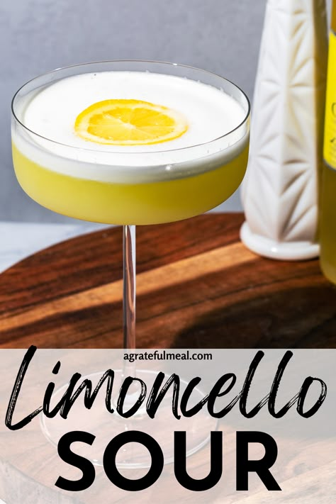 This limoncello sour cocktail recipe is one of the best Italian drinks and the perfect combination of sweet and sour. Made with limoncello, lemon juice, and egg whites, this refreshing and light cocktail will be your new favorite lemon cocktail. It is similar to a limoncello martini and the best cocktail recipe that everyone will love! Caravella Limoncello Drinks, Egg White Drink Recipe, Lemon Cello Drinks, Drinks With Limoncello, Lemonchello Drinks Cocktails, Lemoncello Recipes Drinks, Lemon Juice Cocktail, Lemonchello Drinks, Yellow Cocktails