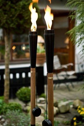 Outdoor Oil Torches - Ideas on Foter Back Yard Lights, Juice Counter, Pretty Balcony, St Lucia Beach, Fire Decor, Staff Design, Wine Bottle Tiki, Wine Bottle Tiki Torch, Garden Torch